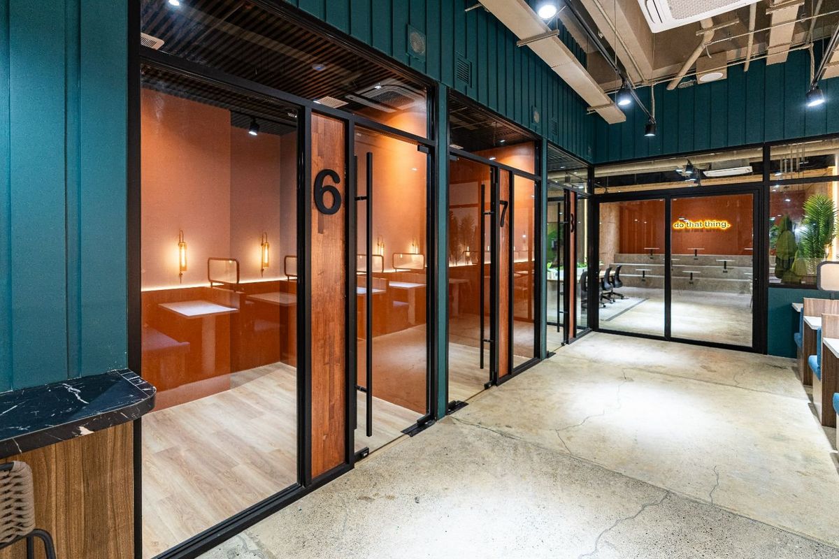 The row of private offices with glass doors
